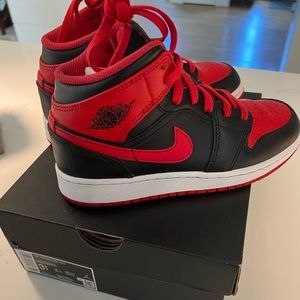 Kids size 3.5 Jordan Mid 1 sneakers.  New condition in box.